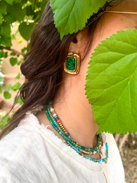 Les boucles d'oreilles HOBI