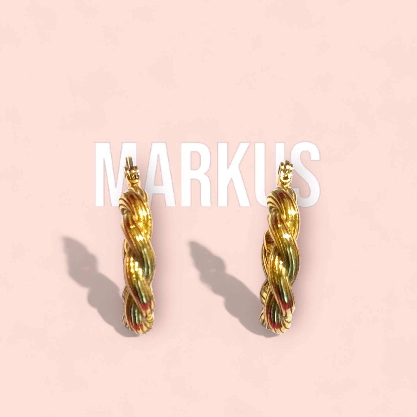 Les boucles d'oreilles MARKUS