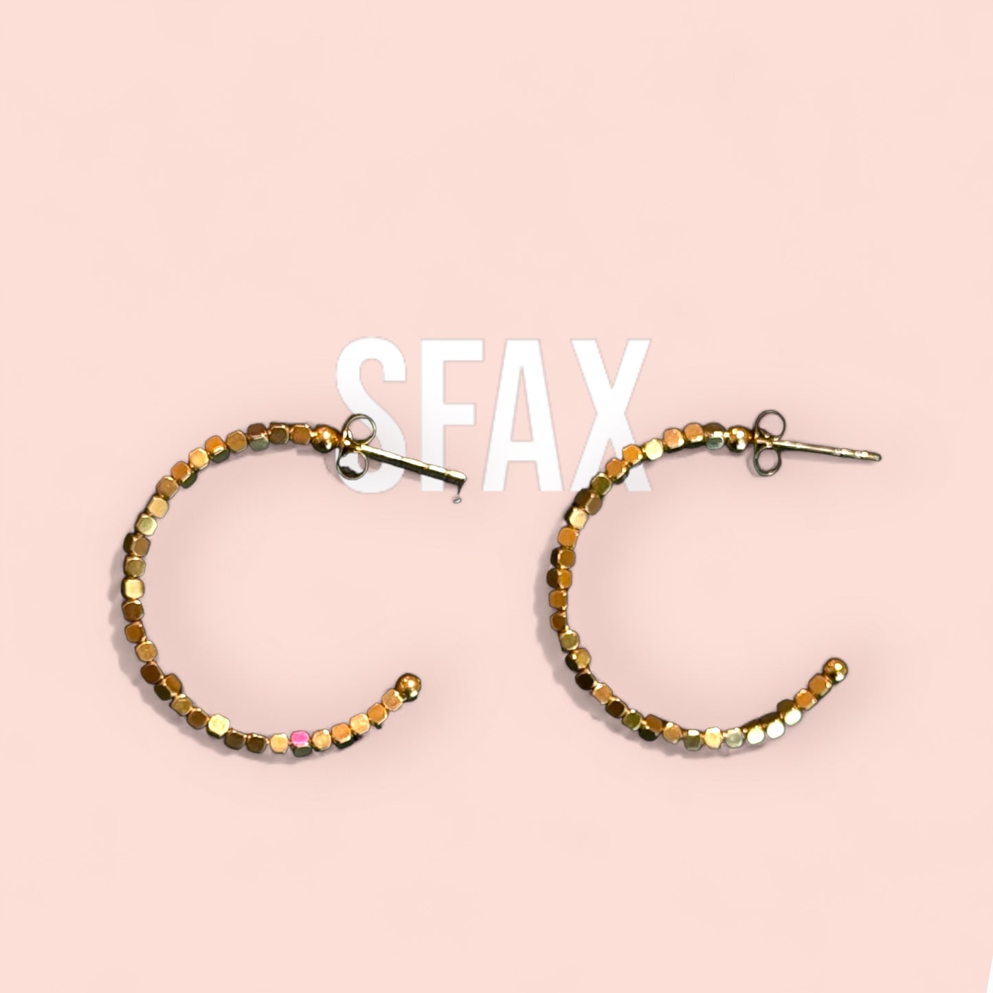 Les boucles d'oreilles SFAX