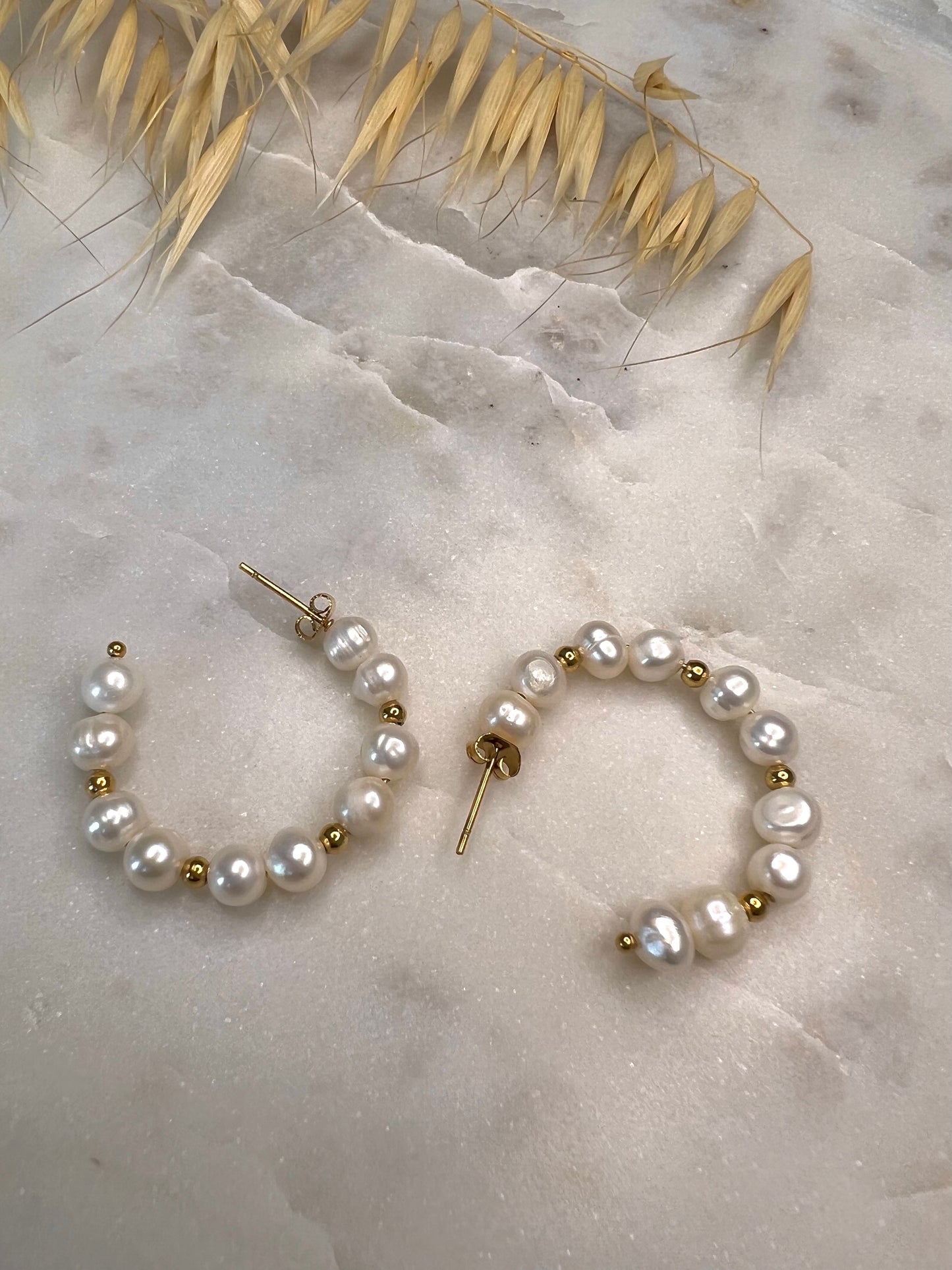 Les boucles d'oreilles RIVY