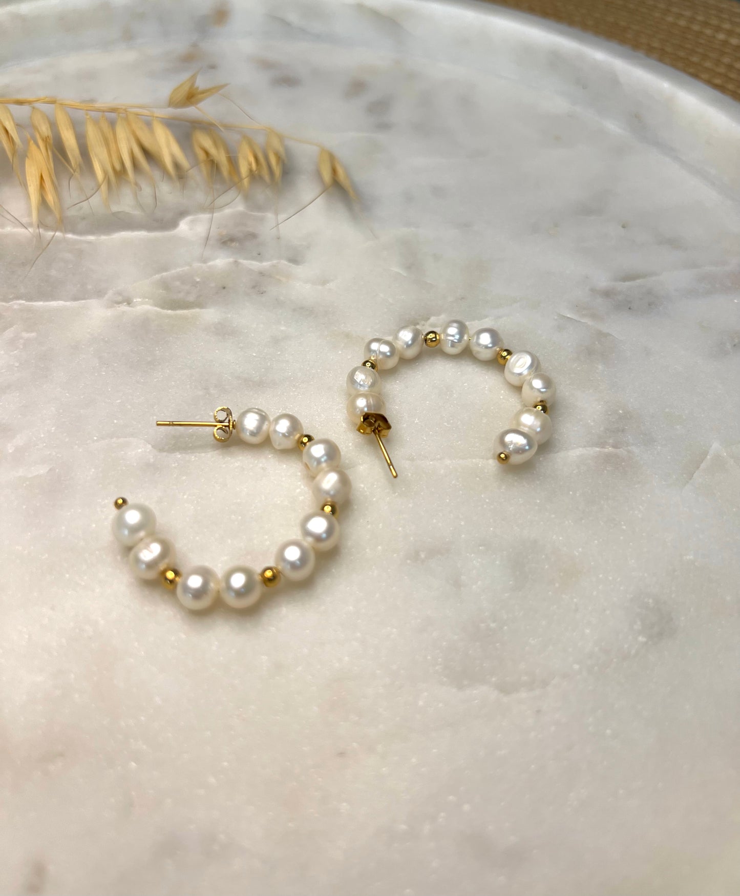 Les boucles d'oreilles RIVY