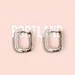 Les boucles d'oreilles PORTLAND